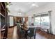 Bright formal dining room with hardwood floors and adjacent living area at 7610 N Via De Manana Dr, Scottsdale, AZ 85258