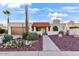Charming single-story home featuring desert landscaping and a terracotta tile roof at 7610 N Via De Manana Dr, Scottsdale, AZ 85258