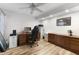 Spacious home office featuring hard surface floors and ample storage space at 7610 N Via De Manana Dr, Scottsdale, AZ 85258