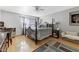 Light, bright bedroom features neutral walls, a ceiling fan, and stylish decor at 7610 N Via De Manana Dr, Scottsdale, AZ 85258