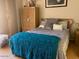 Cozy bedroom featuring a queen size bed and natural wood toned furniture at 774 E Morningside Dr, Phoenix, AZ 85022