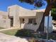 Exterior view of a modern home with gated front yard and covered entryway at 774 E Morningside Dr, Phoenix, AZ 85022