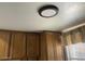 Close-up of kitchen cabinets and modern lighting at 774 E Morningside Dr, Phoenix, AZ 85022