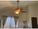 A living room with a ceiling fan and lighting that enhances the home's style and design at 774 E Morningside Dr, Phoenix, AZ 85022