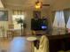 Cozy living room showcasing a large TV, comfortable seating, and natural light at 774 E Morningside Dr, Phoenix, AZ 85022