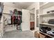 Walk-in closet with shelving and access to the ensuite bathroom at 7858 W Fetlock Trl, Peoria, AZ 85383