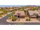 Charming single-Gathering home with desert landscaping, a paver driveway, and a tile roof at 8304 E Inca St, Mesa, AZ 85207