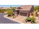 Charming single-Gathering home with desert landscaping, a paver driveway, and a tile roof at 8304 E Inca St, Mesa, AZ 85207
