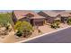 Charming single-Gathering home with desert landscaping, a paver driveway, and a tile roof at 8304 E Inca St, Mesa, AZ 85207