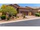 Charming single-Gathering home with a well-manicured lawn, desert landscaping, and a spacious two-car garage at 8304 E Inca St, Mesa, AZ 85207