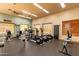 Community gym featuring modern fitness equipment like treadmills and ellipticals, as well as mounted televisions at 8304 E Inca St, Mesa, AZ 85207