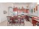 Modern kitchen with stainless steel appliances, a breakfast bar, and ample cabinet space at 8304 E Inca St, Mesa, AZ 85207