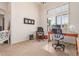 Bright office with natural light, carpet flooring, and a comfortable workspace at 8304 E Inca St, Mesa, AZ 85207