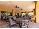 Covered patio with outdoor seating and fireplace feature at 8304 E Inca St, Mesa, AZ 85207