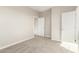 Inviting bedroom with neutral walls, carpet, and convenient access to other areas of the home at 9249 E Sector Dr, Mesa, AZ 85212