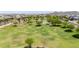 Community park featuring sprawling green space with play areas and sports facilities at 9372 W Louise Dr, Peoria, AZ 85383