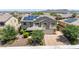 Lovely two-story home featuring solar panels, a well-maintained front yard, and charming curb appeal at 9372 W Louise Dr, Peoria, AZ 85383