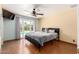 Bright bedroom with hardwood floors and access to backyard pool at 9714 N 55Th Dr, Glendale, AZ 85302