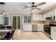 Updated kitchen with stainless steel appliances, neutral colors, and tile flooring at 9714 N 55Th Dr, Glendale, AZ 85302