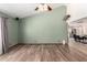 Open-concept home featuring updated flooring, neutral walls, and direct access to kitchen at 9714 N 55Th Dr, Glendale, AZ 85302