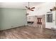 Open-concept home featuring updated flooring, neutral walls, with a vaulted ceiling at 9714 N 55Th Dr, Glendale, AZ 85302