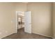 Bedroom view into the hallway and open concept kitchen and living areas at 986 W Citrus Way, Chandler, AZ 85248