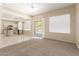 Open-concept living room with views of the kitchen, back yard and pool at 986 W Citrus Way, Chandler, AZ 85248