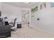 This spacious home office boasts plush carpeting and neutral decor at 997 E White Wing Dr, Casa Grande, AZ 85122