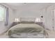 Comfortable primary bedroom with neutral tones, side tables, and lamps at 997 E White Wing Dr, Casa Grande, AZ 85122