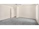 Spacious bedroom featuring plush carpeting, ceiling fan, and a bright airy atmosphere at 11033 E Keats Ave, Mesa, AZ 85209