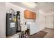 Bright laundry room features washer, dryer, and cabinet space at 11033 E Keats Ave, Mesa, AZ 85209
