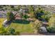 Spacious lot featuring a lush green backyard, multiple buildings, and mature trees at 11143 E Vallejo St, Chandler, AZ 85248