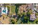 Aerial view displays the property with large backyard, shed, greenhouse and community at 11143 E Vallejo St, Chandler, AZ 85248