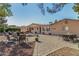 Spacious backyard with brick patio, multiple seating areas, and desert landscaping at 11143 E Vallejo St, Chandler, AZ 85248