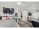Bright bedroom featuring a bed, closet, desk area with carpet and ample natural light at 11143 E Vallejo St, Chandler, AZ 85248