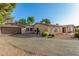 Attractive single-story home with a brown garage door and neutral stucco at 11143 E Vallejo St, Chandler, AZ 85248