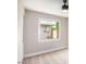 This bedroom offers a new window and carpet at 1228 E Fremont Dr, Tempe, AZ 85282