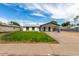 Attractive single story home with a convenient carport and lush front lawn at 1228 E Fremont Dr, Tempe, AZ 85282