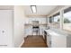 Updated kitchen with stainless steel appliances, ample cabinet space, and bright, airy feel at 1228 E Fremont Dr, Tempe, AZ 85282