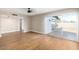 Spacious living area with wood-look floors, sliding doors to backyard, and ample natural light at 1228 E Fremont Dr, Tempe, AZ 85282