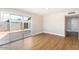 Open living space with sliding glass doors to the backyard and contemporary flooring at 1228 E Fremont Dr, Tempe, AZ 85282