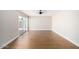 Living room features laminate flooring, a sliding glass door and neutral paint at 1228 E Fremont Dr, Tempe, AZ 85282