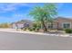 Charming single-story home with a three-car garage and landscaped front yard at 1336 E Belmont Ave, Phoenix, AZ 85020