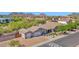 Beautiful home with a three-car garage, desert landscaping, and mountain views at 1336 E Belmont Ave, Phoenix, AZ 85020