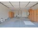 Spacious garage featuring built-in cabinets for storage and overhead lighting at 1336 E Belmont Ave, Phoenix, AZ 85020