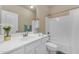 Bright bathroom with single vanity, white cabinets, and tub-shower combination at 14200 W Village Pkwy # 2128, Litchfield Park, AZ 85340