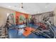 Well-equipped fitness center featuring modern exercise machines and free weights for a complete workout at 14200 W Village Pkwy # 2128, Litchfield Park, AZ 85340