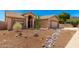 Inviting single-story home showcasing desert landscaping and charming curb appeal at 15226 S 14Th Dr, Phoenix, AZ 85045