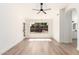Empty living space with wood-look flooring and a backyard view at 15226 S 14Th Dr, Phoenix, AZ 85045