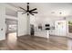 Open floor plan with high ceilings showcasing kitchen, living and dining areas at 15226 S 14Th Dr, Phoenix, AZ 85045